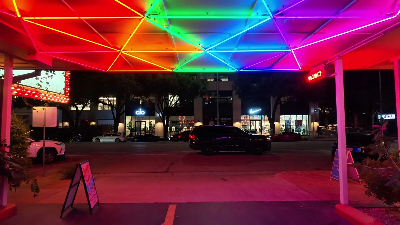 The rainbow neon canopy over a South Congress lot at night, from a Pieter Studio shoot.