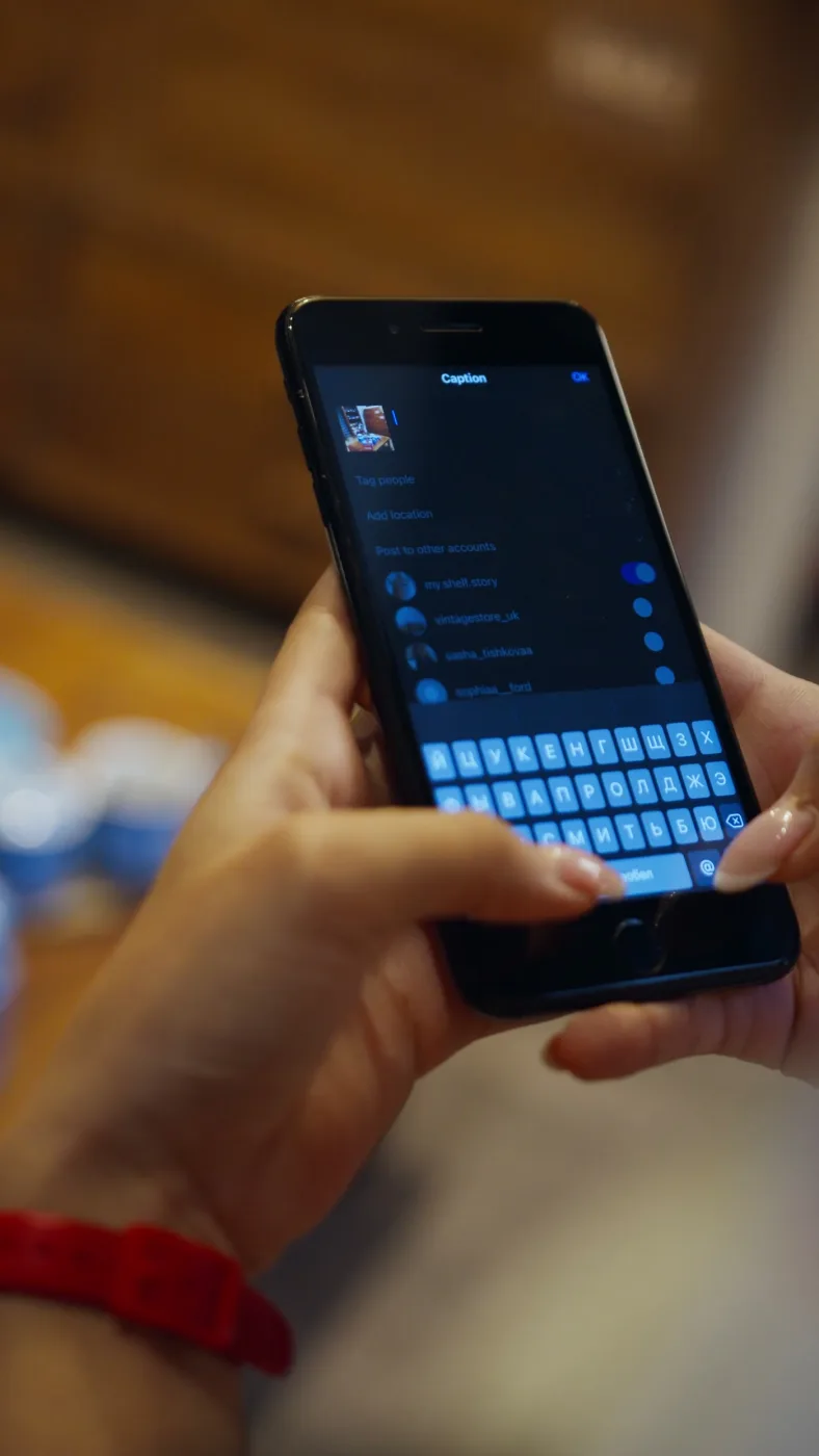 Hands on a phone, moving between apps.